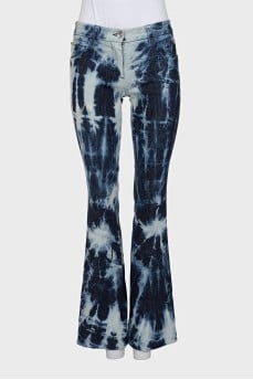 Tie-dye flared jeans