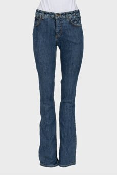 Jeans with a monogram on the waistband