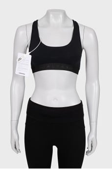 Black sports top with tag