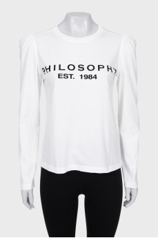 Long sleeve top with a voluminous print