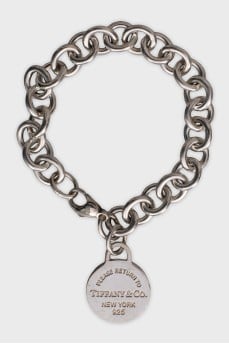 Silver bracelet with signature charm