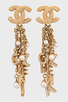 Gold earrings with a pendant