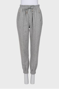 Gray trousers with creases