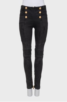 Skinny jeans with gold buttons
