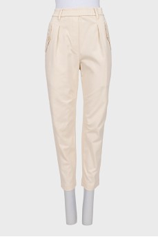 Cropped white trousers with elastic waistband
