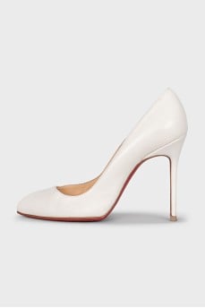 White leather pumps