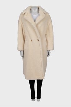 Beige fur coat with long pile