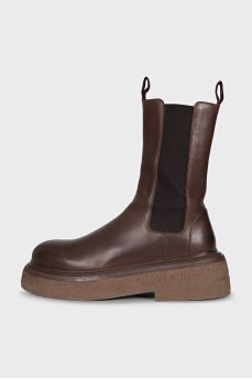 Brown leather boots with high soles