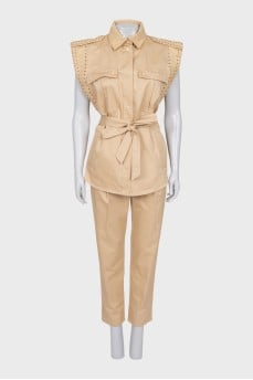 Beige suit consisting of a vest and trousers