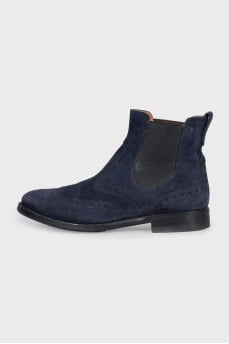 Blue suede boots with perforations