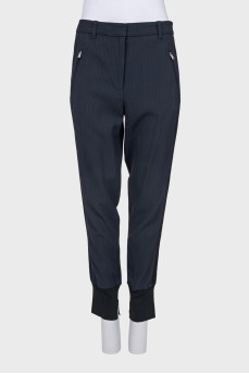Tapered striped trousers with cuffs