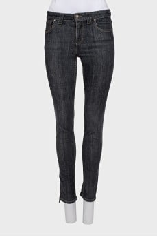 Low rise skinny jeans with zippers
