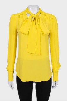 Yellow blouse with ties