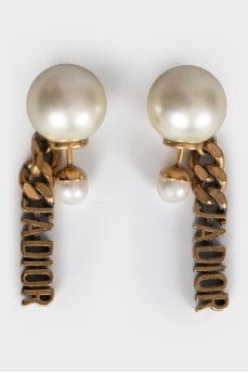 Earrings with a brand logo