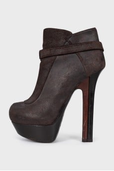Brown leather ankle boots with buckle