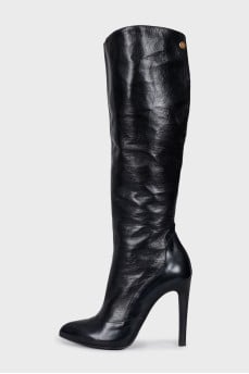 Black leather boots with pointed toes