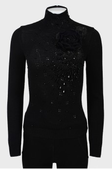 A vintage sweater under the throat with stones and beads