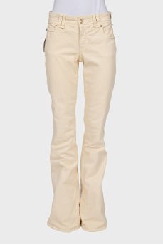 Beige flared jeans