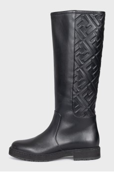 Black leather boots with branded embossing
