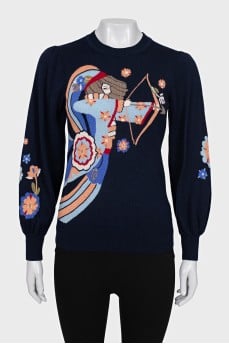 Knitted blue sweater with a pattern