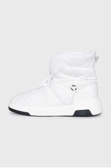 White boots with a logo