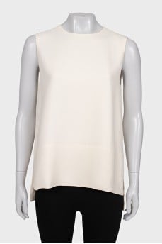 White sleeveless blouse