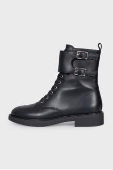 Black leather boots with straps
