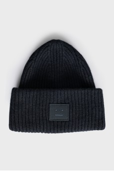 Black knitted hat with embroidery