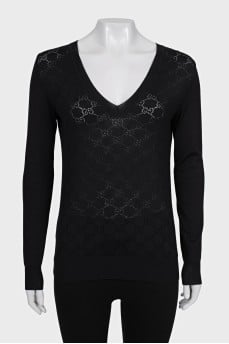 Black pullover with signature monogram