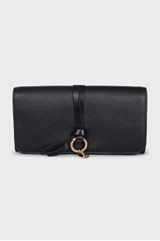 Black leather wallet with tag