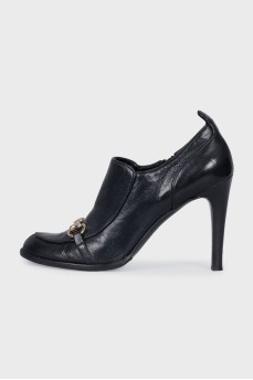 Black shoes with metallic decor