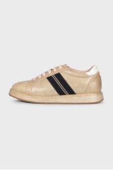 Gold leather sneakers
