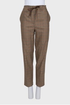 Tapered trousers in houndstooth print