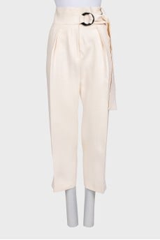 High-waisted trousers with a belt
