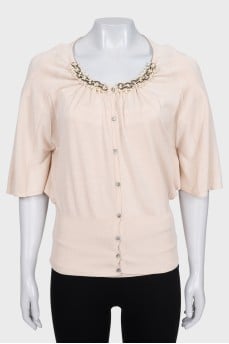 Beige suit with a cardigan and a T-shirt