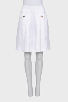 Large pleated skirt with buttons