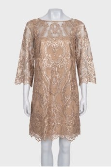 A straight-cut dress decorated with sequins