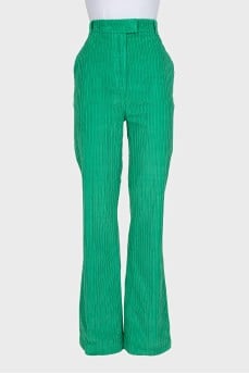 Green corduroy trousers with tag