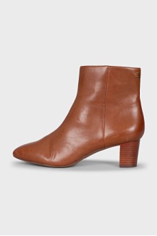 Brown leather ankle boots with a stacked heel