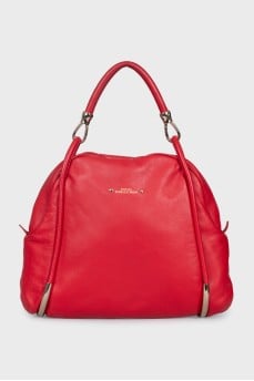 Leather bag with metal elements