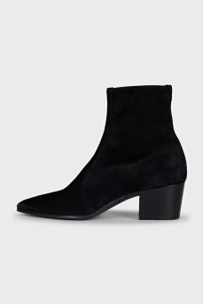 Black suede ankle boots with a stacked heel