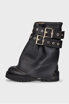 Leather boots with a patch