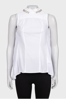 Blouse with pleats decorated with crystals