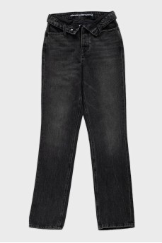 Black jeans with an accent belt