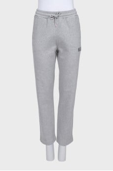 Gray sports trousers with drawstrings