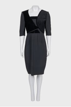 Fitted dress with a gold zipper on the back