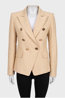 Fitted beige jacket with signature print