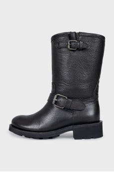 Black leather boots with straps