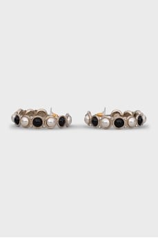 Gold-color round earrings with crystals