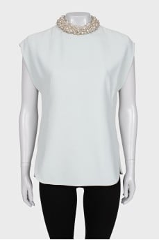 Blue blouse with a decorated collar